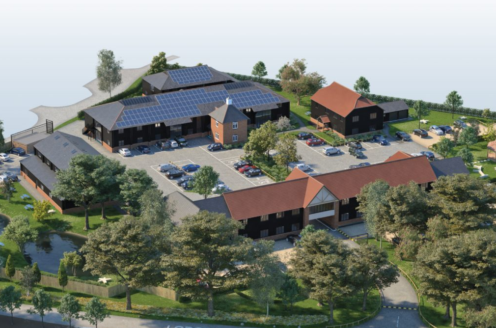 An image of the site where Exacom are based. It is an office complex surrounded by trees.